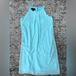 A pretty aqua dress for any fun occasion.